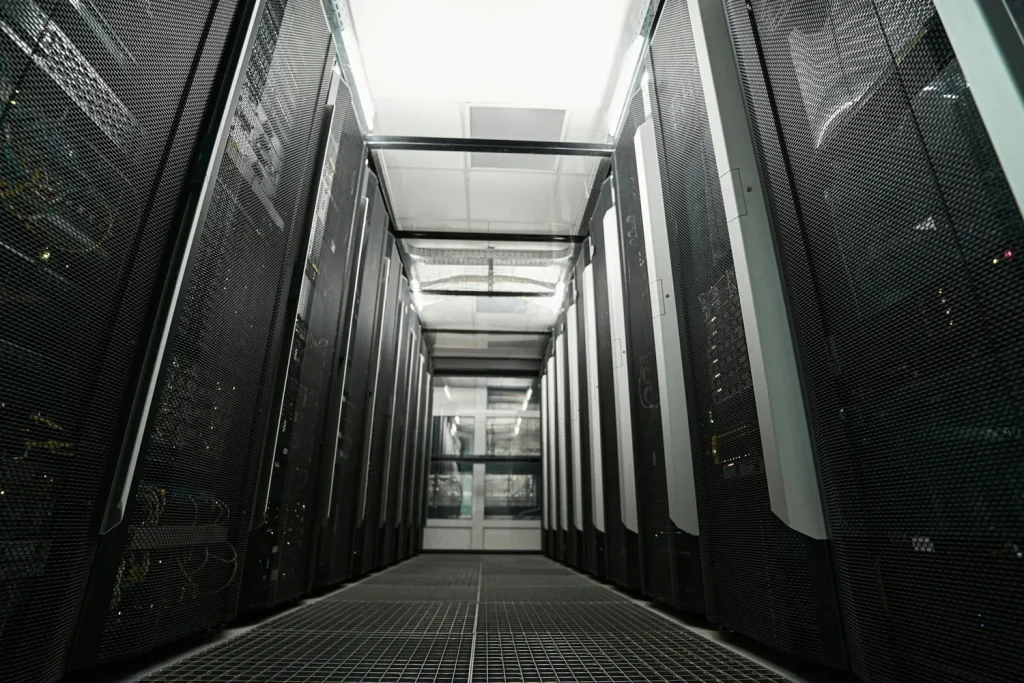 Aisle between enclosed server racks in a data center